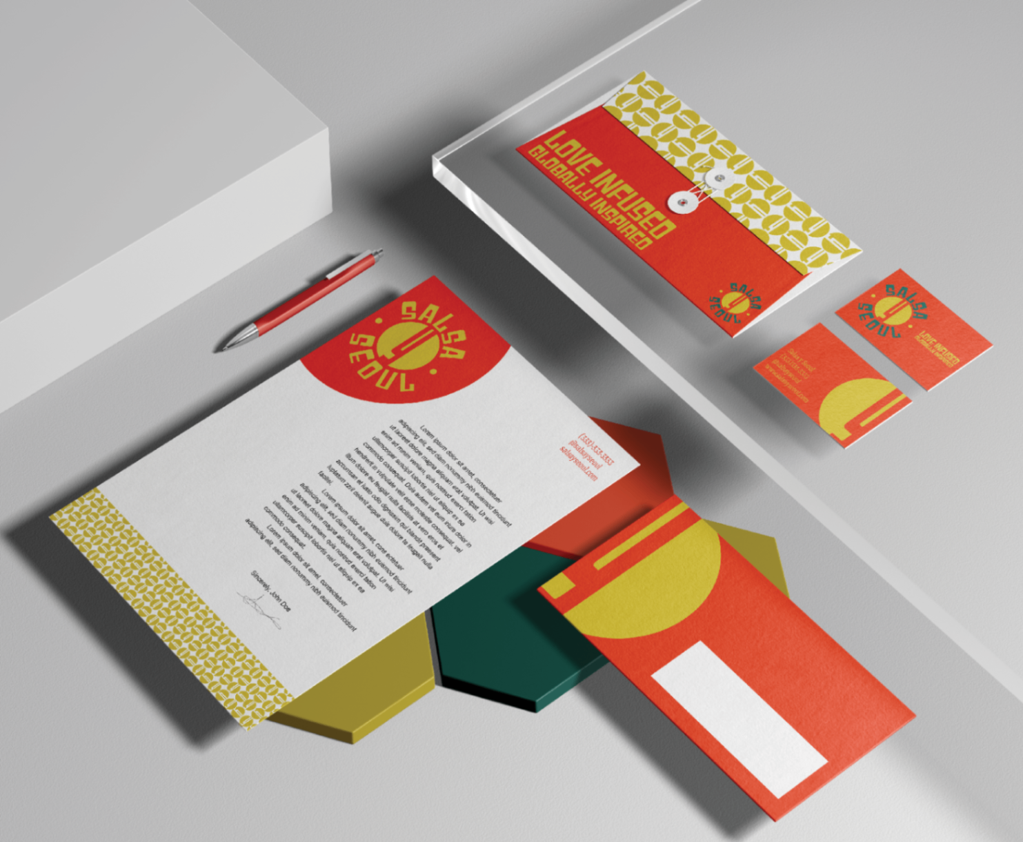 Salsa Y Seoul stationery system with letterhead, envelope, and business cards